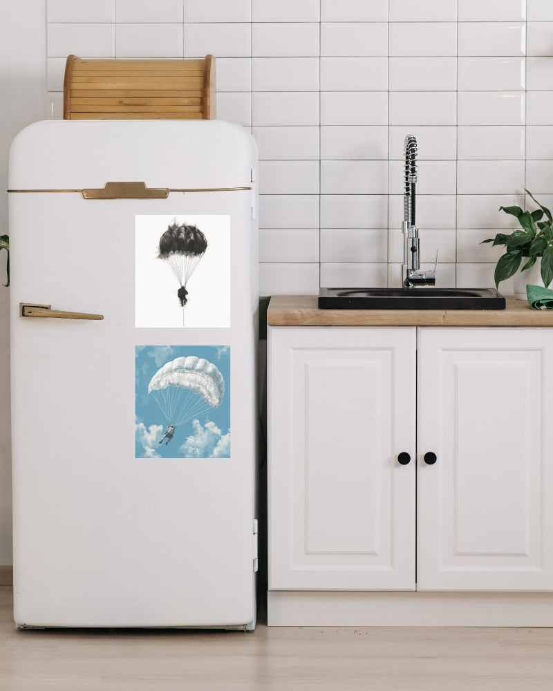 The Art of Freefall - 2 Skydiving magnet prints on a fridge