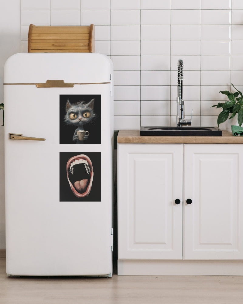 Refrigerator magnet featuring a angry grey cat holding a coffee cup